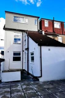Bright and well-maintained exterior of a terrac...