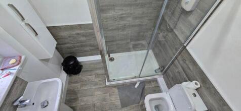 A modern and well-maintained bathroom featuring...