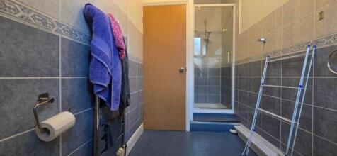 A clean and well-maintained bathroom with moder...