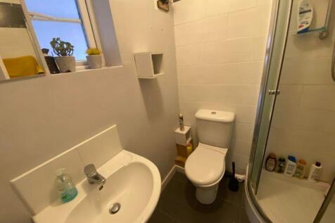 A modern bathroom featuring a clean and functio...