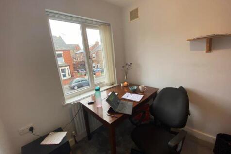 A bright and tidy communal workspace ideal for ...