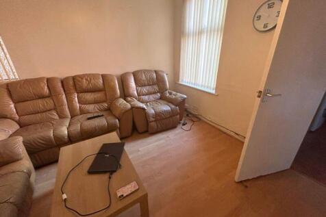 A cozy living room featuring comfortable seatin...