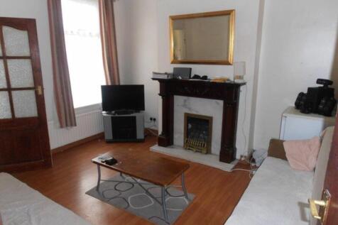 A cozy and inviting living room with a warm atm...