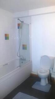 A clean and well-maintained bathroom featuring ...
