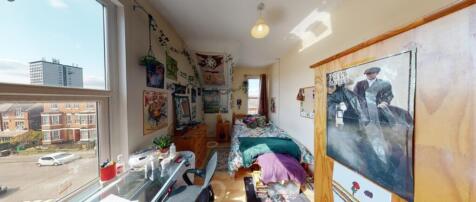 This bright and inviting double bedroom feature...