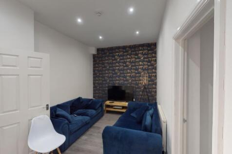 A stylish and inviting large modern living room...