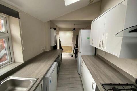 A bright and spacious kitchen featuring modern ...