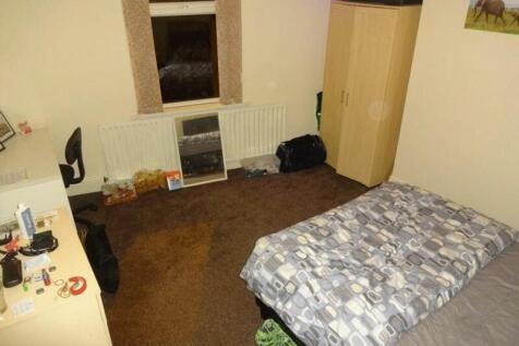 A cozy double bedroom with ample space for rela...