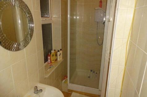 A well-maintained bathroom featuring a modern s...