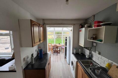A bright and tidy kitchenette with modern ameni...