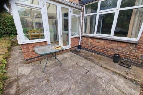 A spacious and well-lit garden area perfect for...