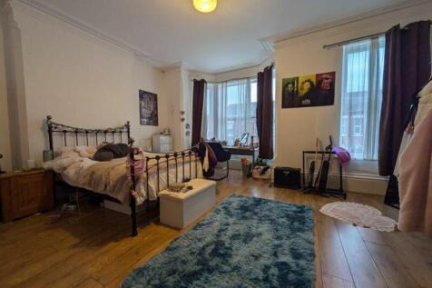A spacious and inviting large double bedroom fi...