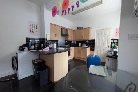 A bright and spacious kitchen with a modern des...