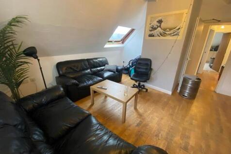 A spacious and inviting living room, perfect fo...