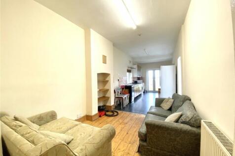 Spacious living area featuring comfortable seat...