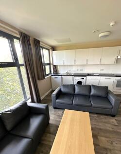 Bright and inviting living room featuring moder...