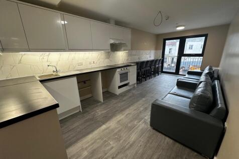 Modern kitchen space with sleek cabinetry and a...
