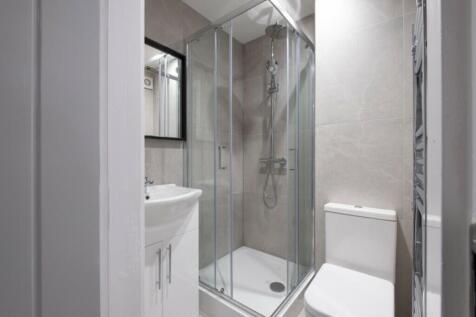 A modern and clean bathroom featuring a sleek s...