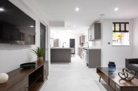 A modern and clean kitchenette with ample space...