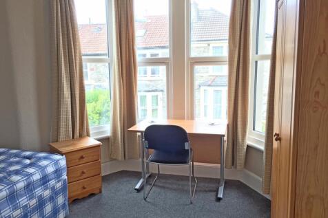 Bright and inviting double bedroom featuring a ...