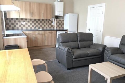 A welcoming kitchen featuring modern appliances...