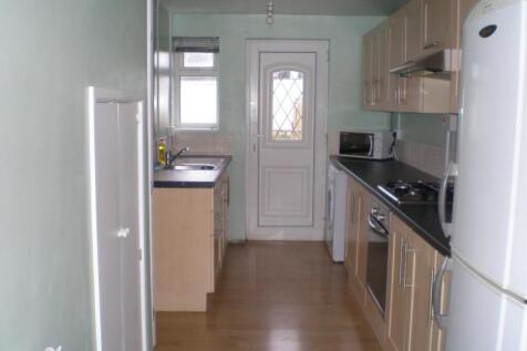 A well-equipped kitchen featuring modern cabine...