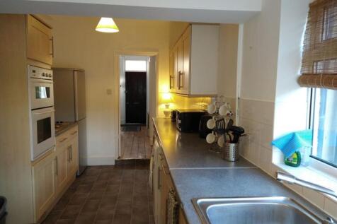 A well-organized kitchen featuring modern appli...