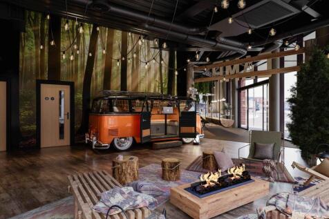 A vibrant and spacious communal lounge featurin...