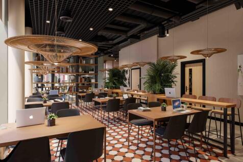 A modern and spacious communal workspace design...