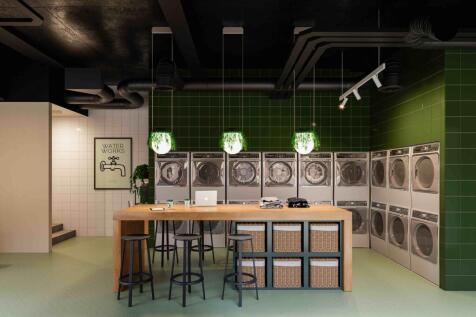 A modern and inviting communal workspace featur...