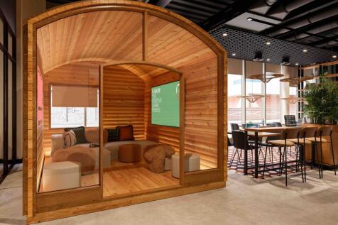 A modern and inviting communal workspace design...