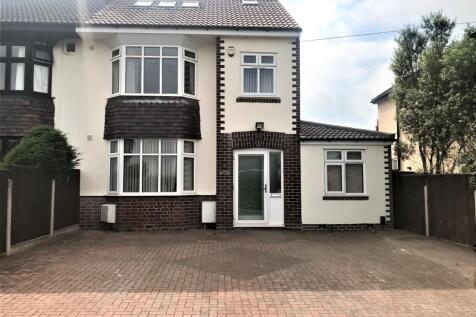 Charming front view of a spacious property, fea...