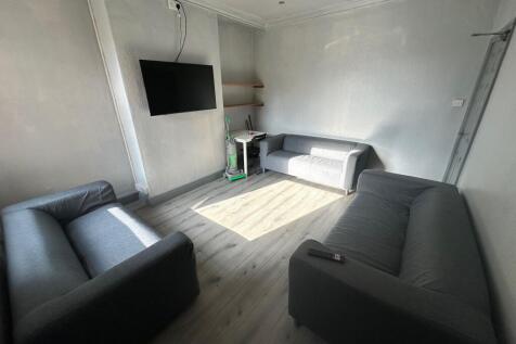 A cozy living room featuring two comfortable so...