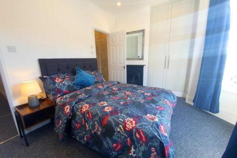 Bright and inviting double bedroom featuring a ...