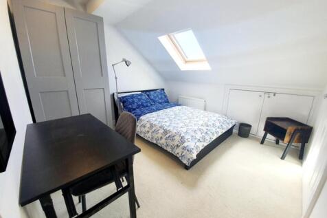 A beautifully designed double bedroom featuring...