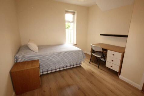 Bright and inviting double bedroom featuring a ...