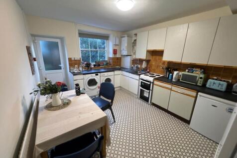 This inviting kitchen features ample counter sp...