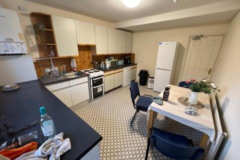 Spacious kitchen area featuring modern applianc...