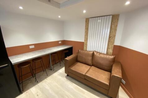 A stylish living room featuring a modern design...