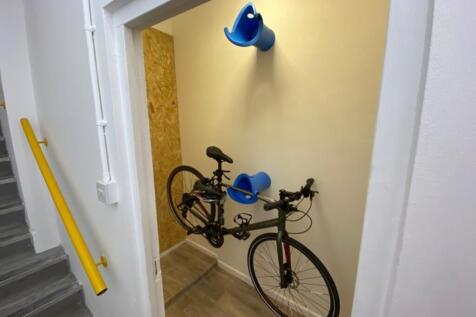 This storage area offers a practical space for ...