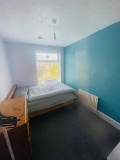 Bright and inviting double bedroom featuring a ...