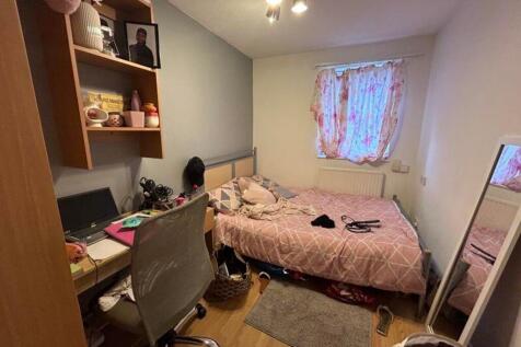 A cozy double bedroom with natural light, perfe...