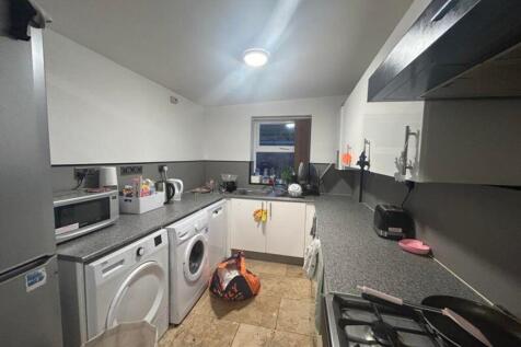 A modern and functional kitchen with ample spac...