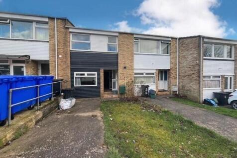 A charming front view of a modern terraced hous...