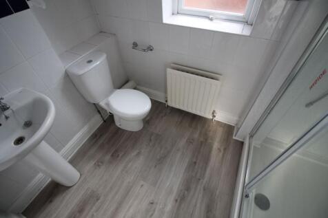 Bright and modern bathroom featuring a clean sh...
