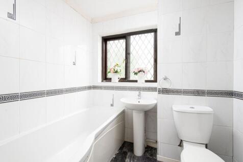 A beautifully designed bathroom suite featuring...