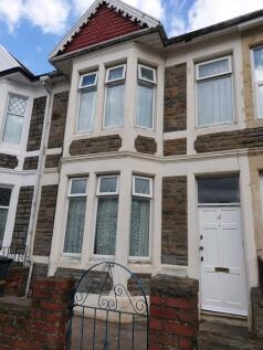 Charming front view of a classic terraced house...