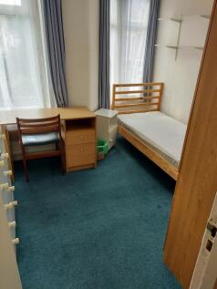 Bright and inviting double bedroom featuring a ...