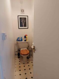A compact and functional single toilet space fe...