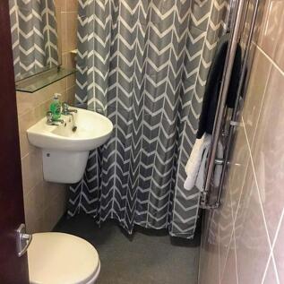 A stylish and modern bathroom featuring contemp...